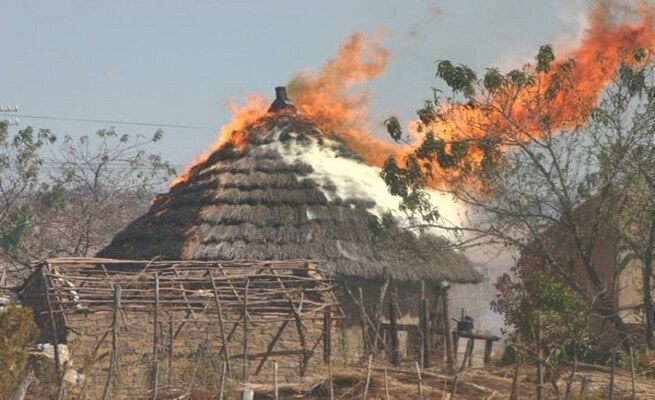 Children narrowly escape as jealous uncle burns down huts while they slept inside