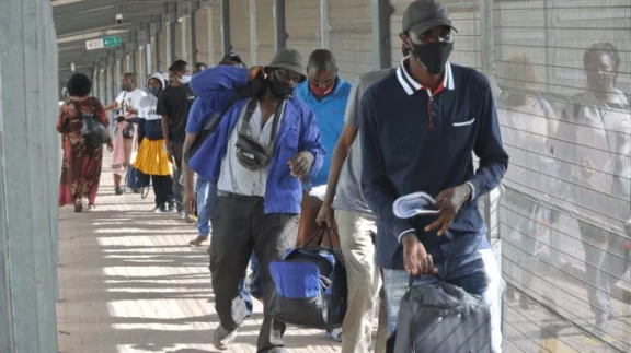 Zimbabwean nationals return home to cast their ballot 