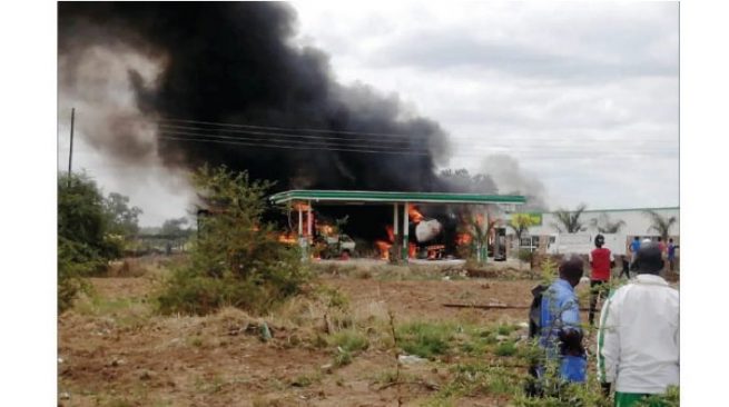 Massive disaster as fuel tanker, 2 haulage trucks, 5 cars and 2 kombis catch fire at service station
